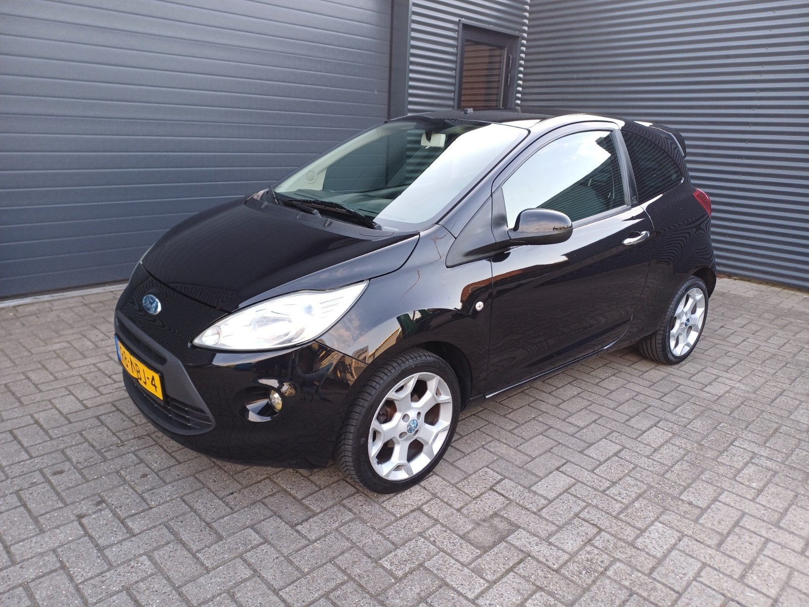 Ford Ka 1.2 51KW 2010 Zwart, Auto's, Voorwielaandrijving, 1242 cc, 4 cilinders, 4 stoelen