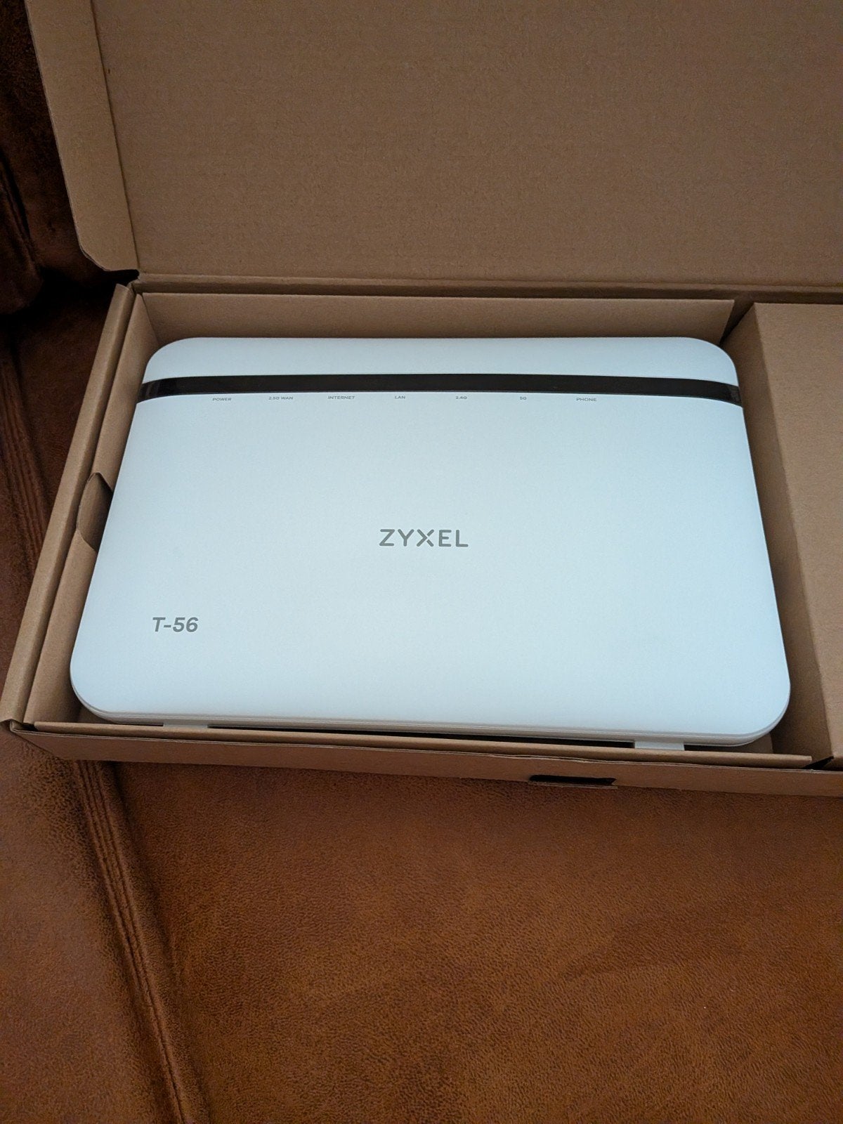 Zyxel T-56 Dual-Band Wireless AX6000 2.5G Ethernet Modem, Computers en Software, Routers en Modems, Ophalen of Verzenden, Zo goed als nieuw