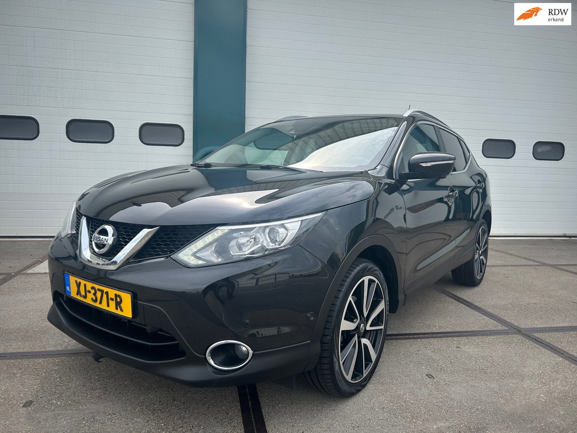Nissan Qashqai 1.2 Tekna, Auto's, Voorwielaandrijving, Euro 5, Gebruikt, Zwart