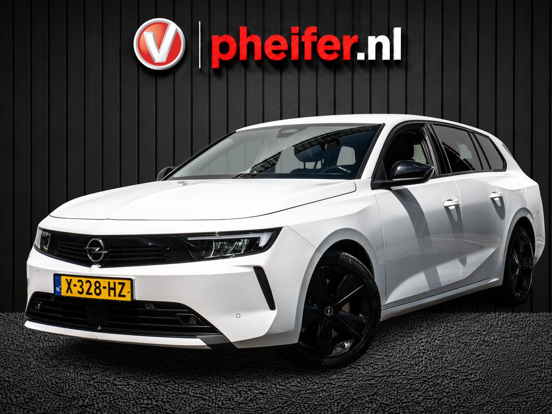 Opel Astra Sports Tourer 1.6 Plug-in Hybrid Business Edition, Auto's, Opel, Stof, Gebruikt, 4 cilinders, Wit
