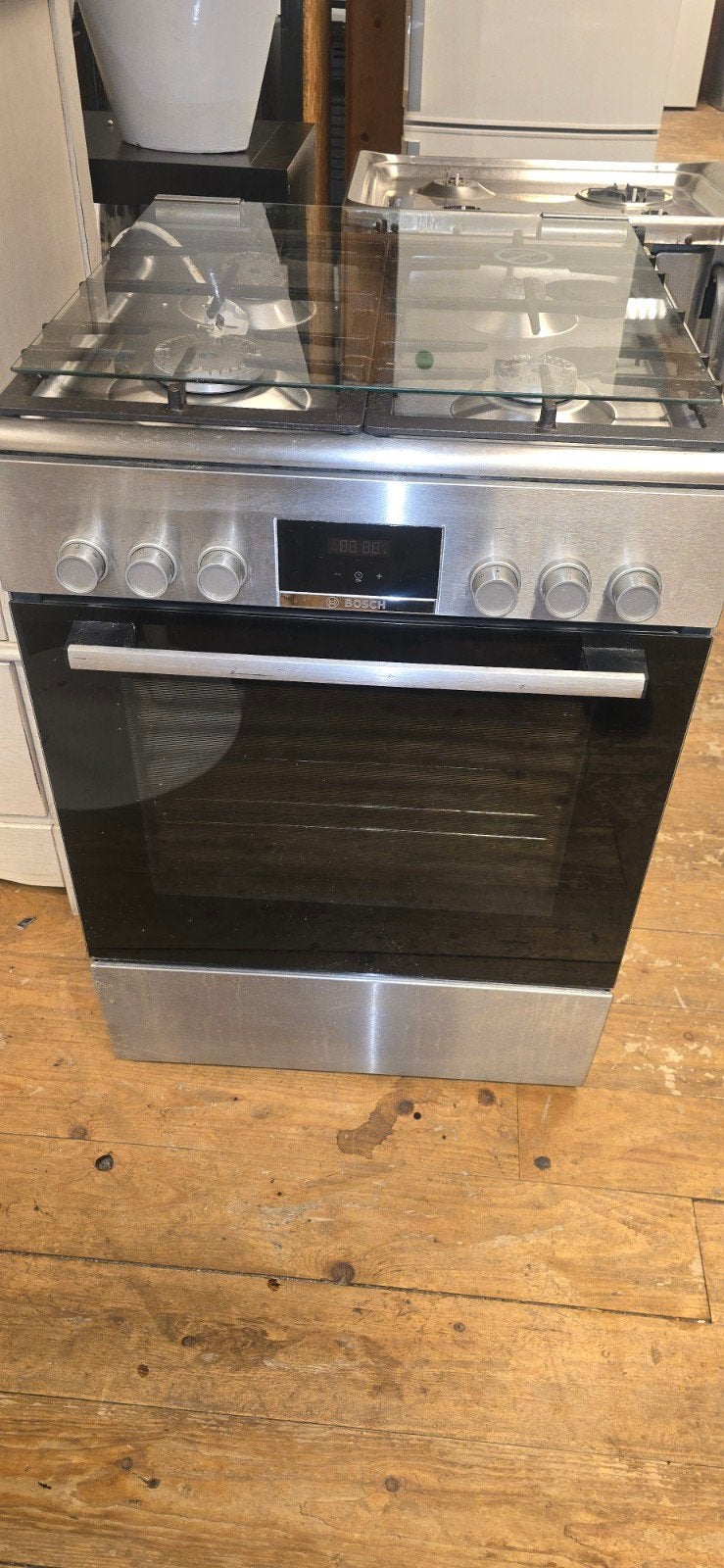 Bosch rvs gasfornuis met garantie, Ophalen, 4 kookzones, Zo goed als nieuw, Gas