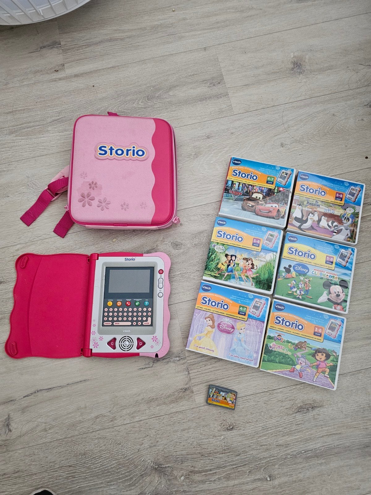Vtech storio spelcomputer + 7 spellen en opbergtas, Kinderen en Baby's, Speelgoed | Vtech, Ophalen of Verzenden, Zo goed als nieuw
