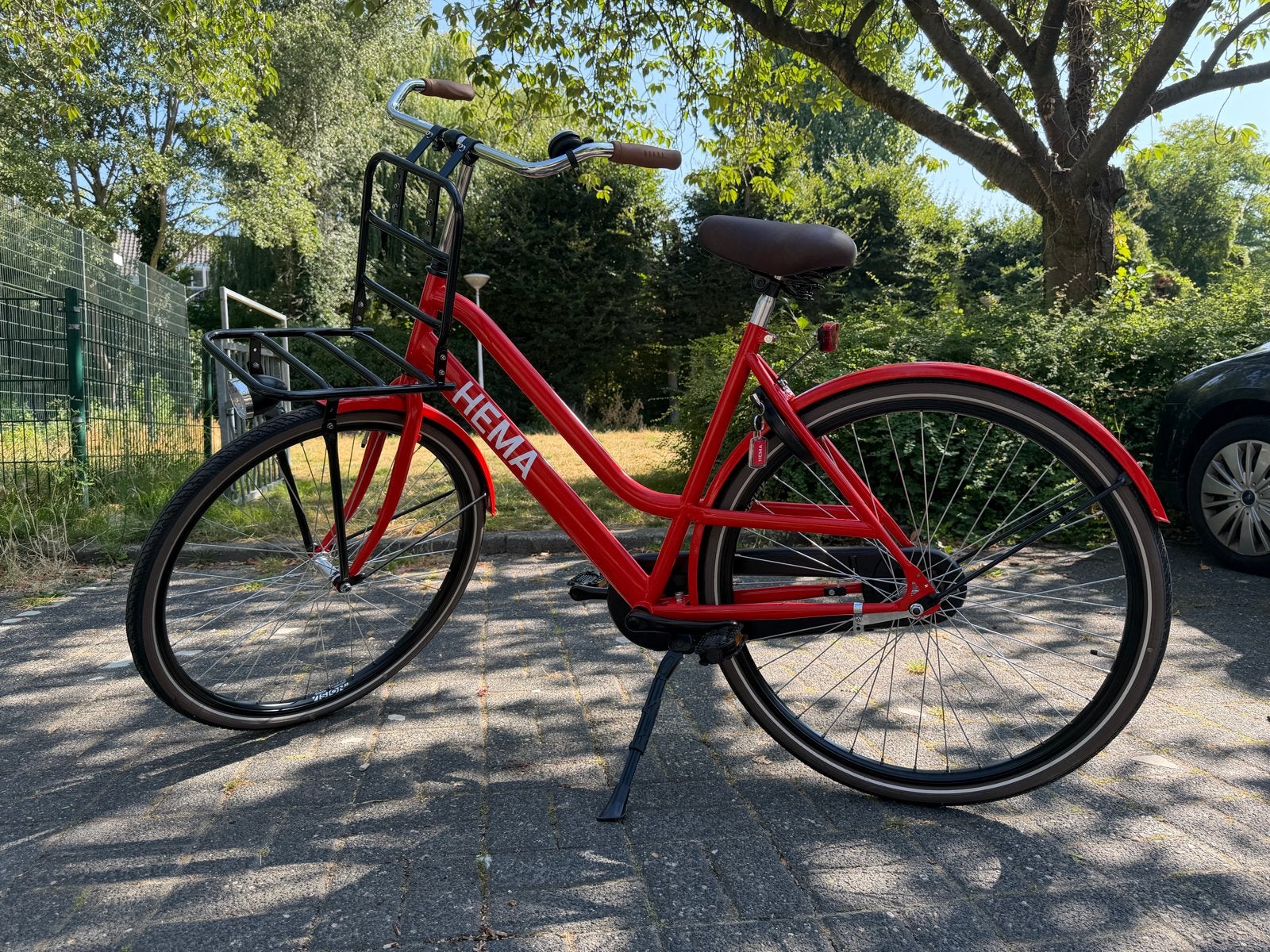 Nieuwe HEMA Dames/Unisex Fiets met Transportrek en AXA Slot, Fietsen en Brommers, Fietsen | Dames | Damesfietsen, Terugtraprem