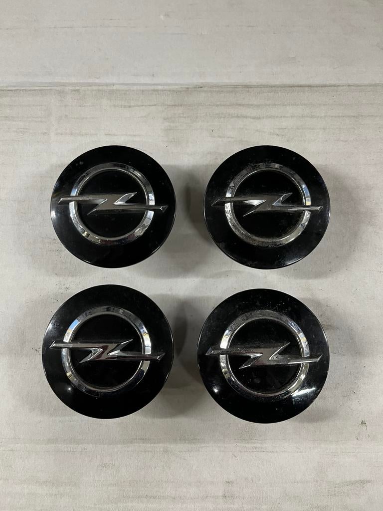 Opel naafkapjes zwart, Ophalen of Verzenden, Gebruikt