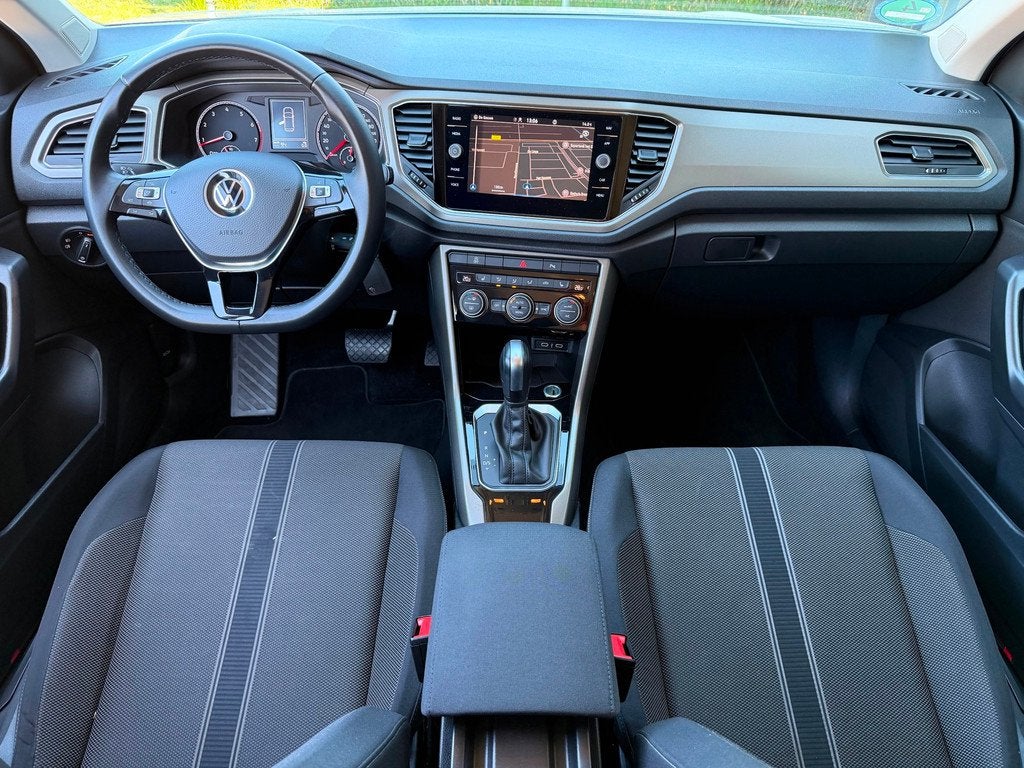 Volkswagen T-Roc 1.5 TSI Sport Business DSG R-Line ACC CarPl, Auto's, Volkswagen, Zwart, 4 cilinders, 150 pk, Leder en Stof
