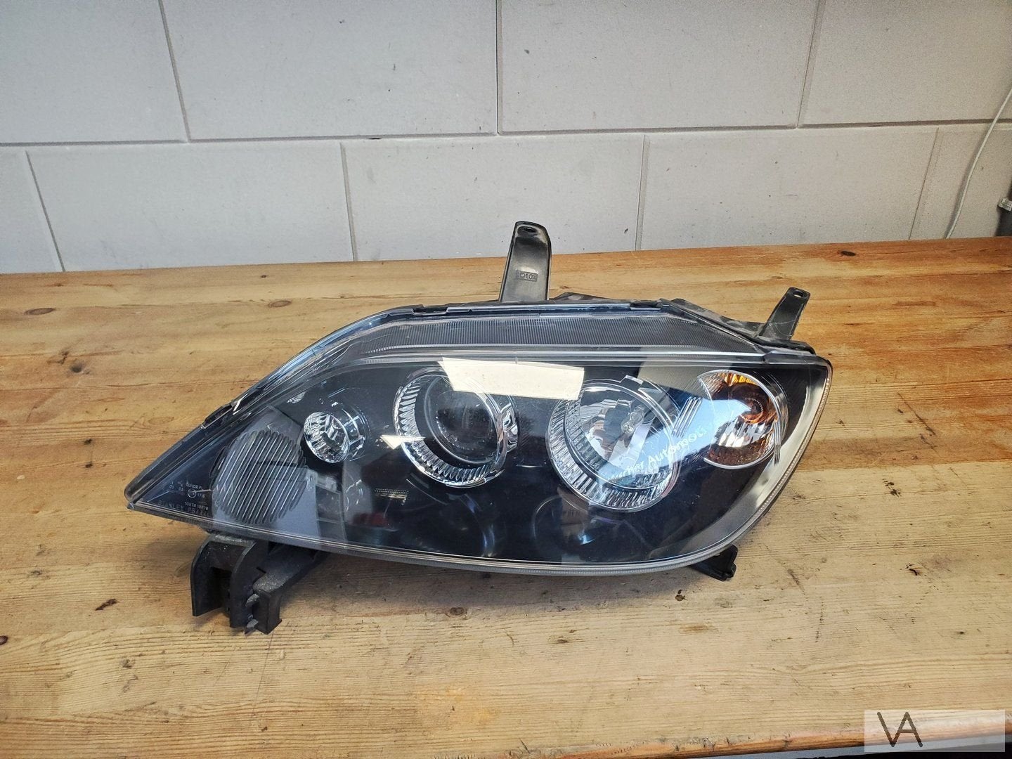 Mazda 2 2002 - 2007 koplamp links nette staat facelift €150, Gebruikt, -, -, Ophalen of Verzenden