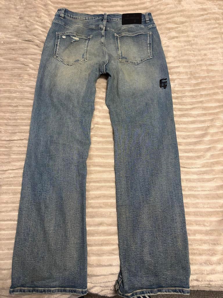 Oversized spijkerbroek met dichte gaten - Eén-Tweetje, Ophalen of Verzenden, Nieuw, Blauw, W33 - W34 (confectie 48/50)