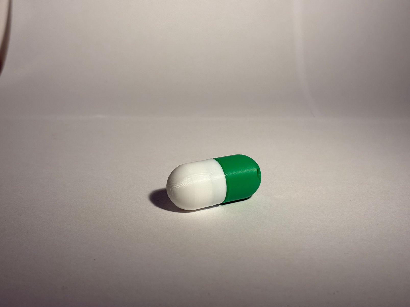 Sleutelhanger pillencapsule, Verzenden, Zo goed als nieuw, Overige typen