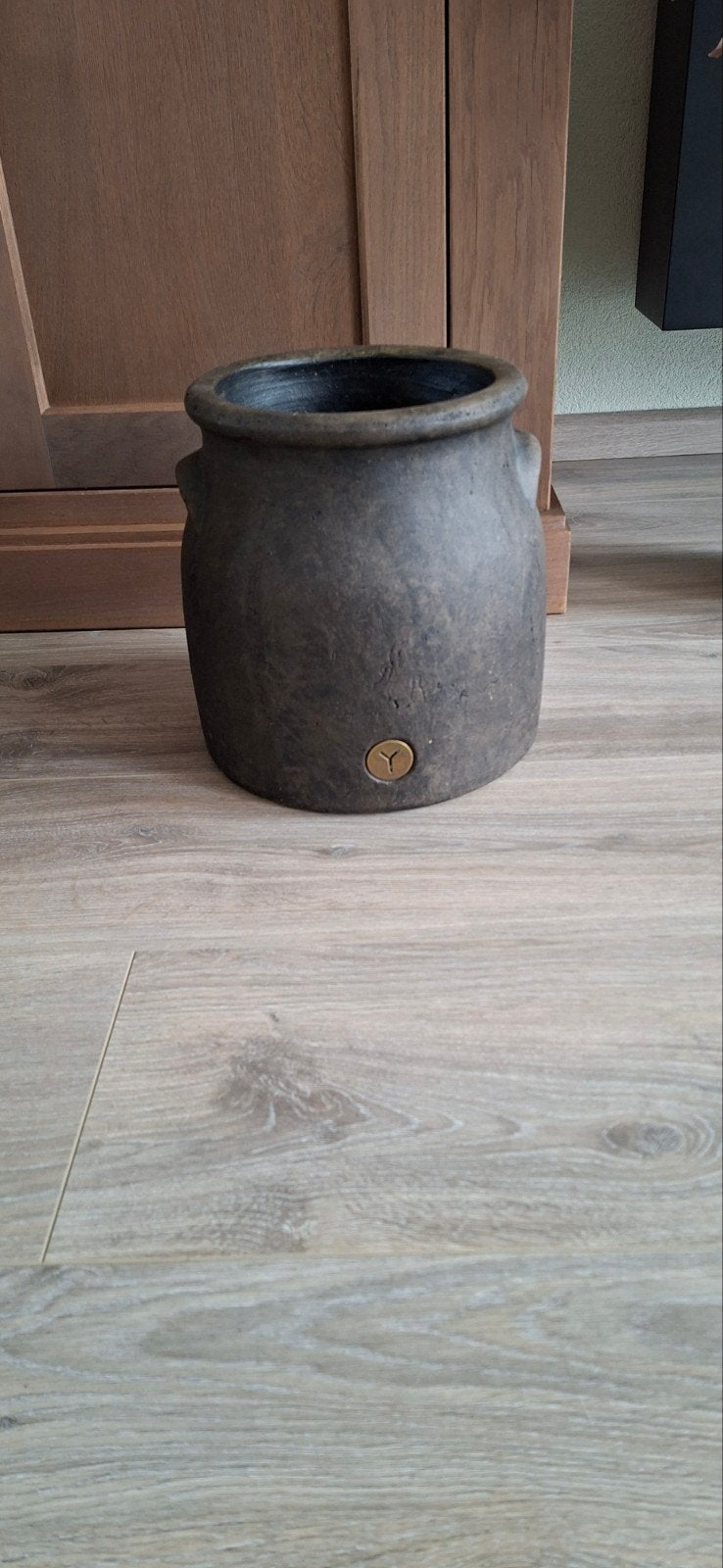 Mooie bloempot, Ophalen
