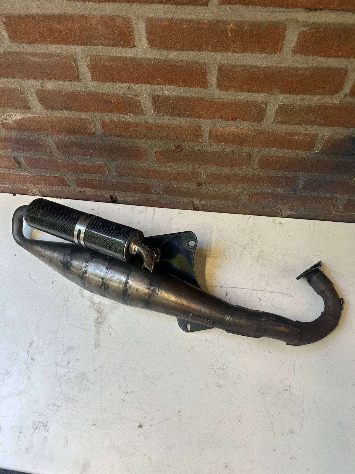 Terug loop uitlaat 125cc/180cc, Ophalen