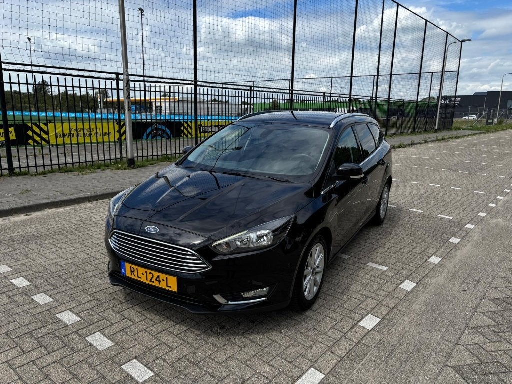 Ford Focus | Titanium 125PK, Zwart, Handgeschakeld, Particulier, 3 cilinders