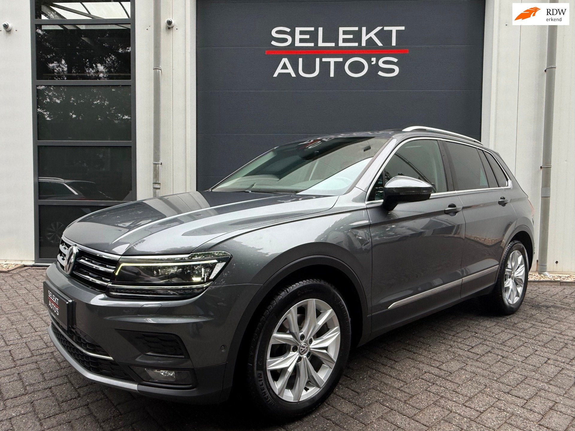 Volkswagen Tiguan 1.5 TSI ACT Highline 150 Pk DSG BTW Pano/V, Dealer onderhouden, 15 km/l, Zwart, 150 pk