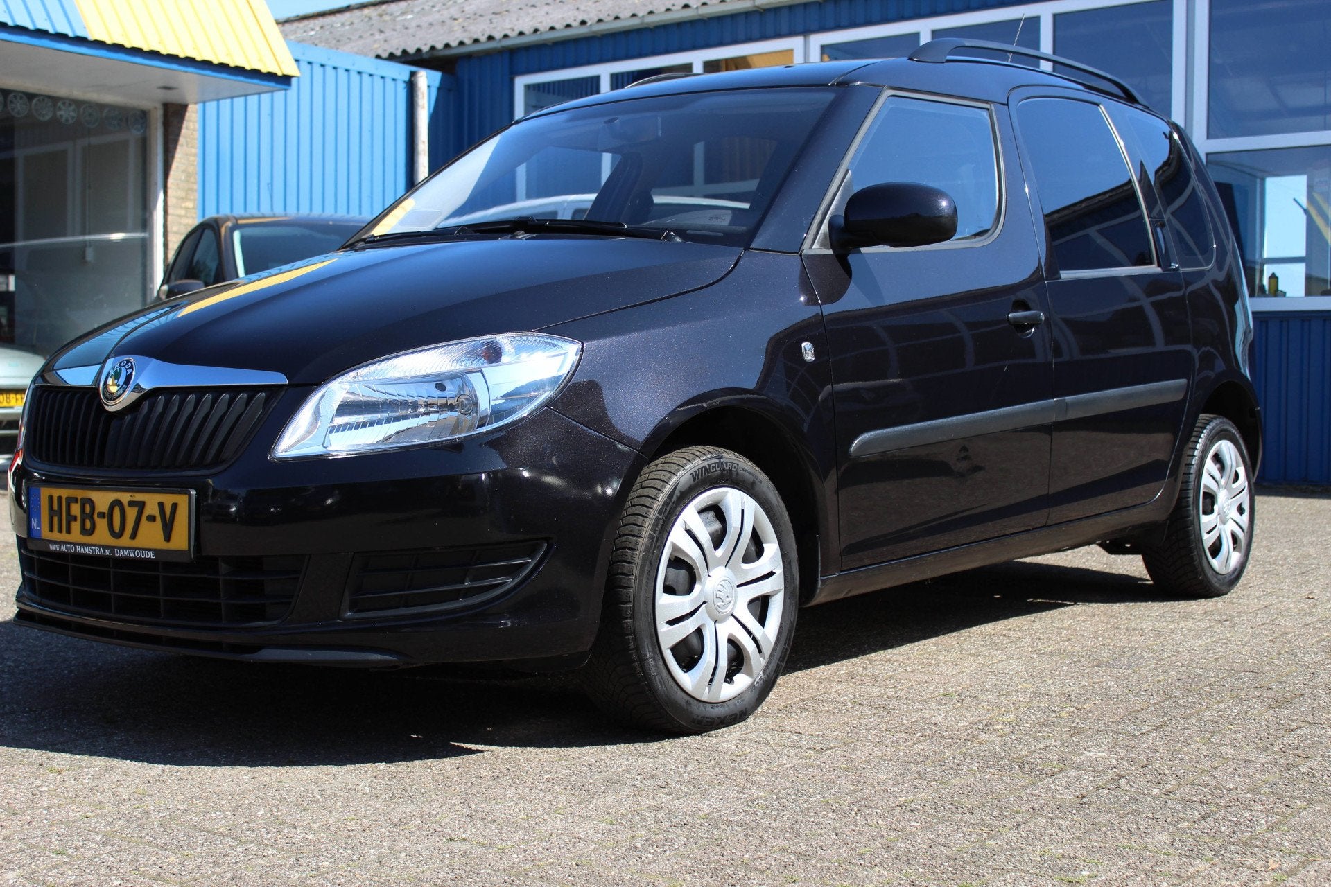Skoda Roomster 1.2i "Plus Edition" Airco + AUX ! (bj 2011), Auto's, Voorwielaandrijving, Dealer onderhouden, Gebruikt, Zwart
