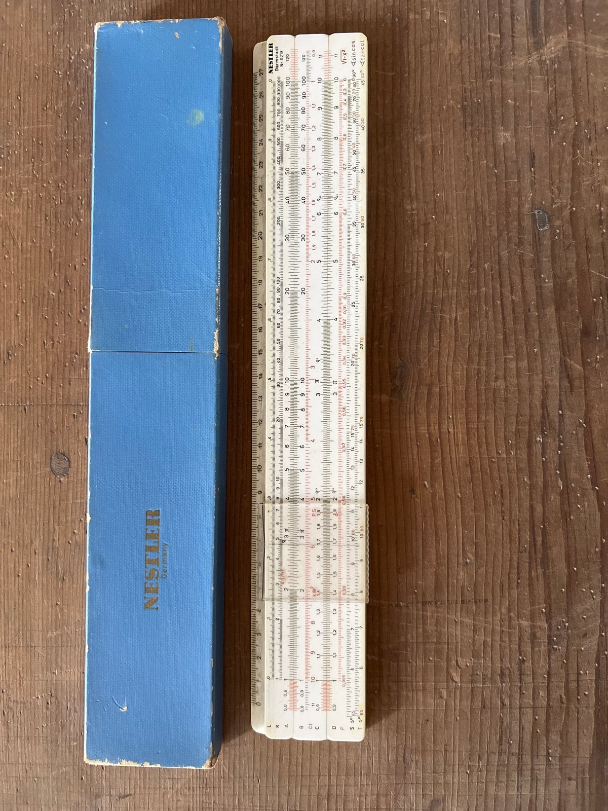 Vintage Nestler rekenliniaal met originele opbergdoos, Antiek en Kunst, Ophalen of Verzenden