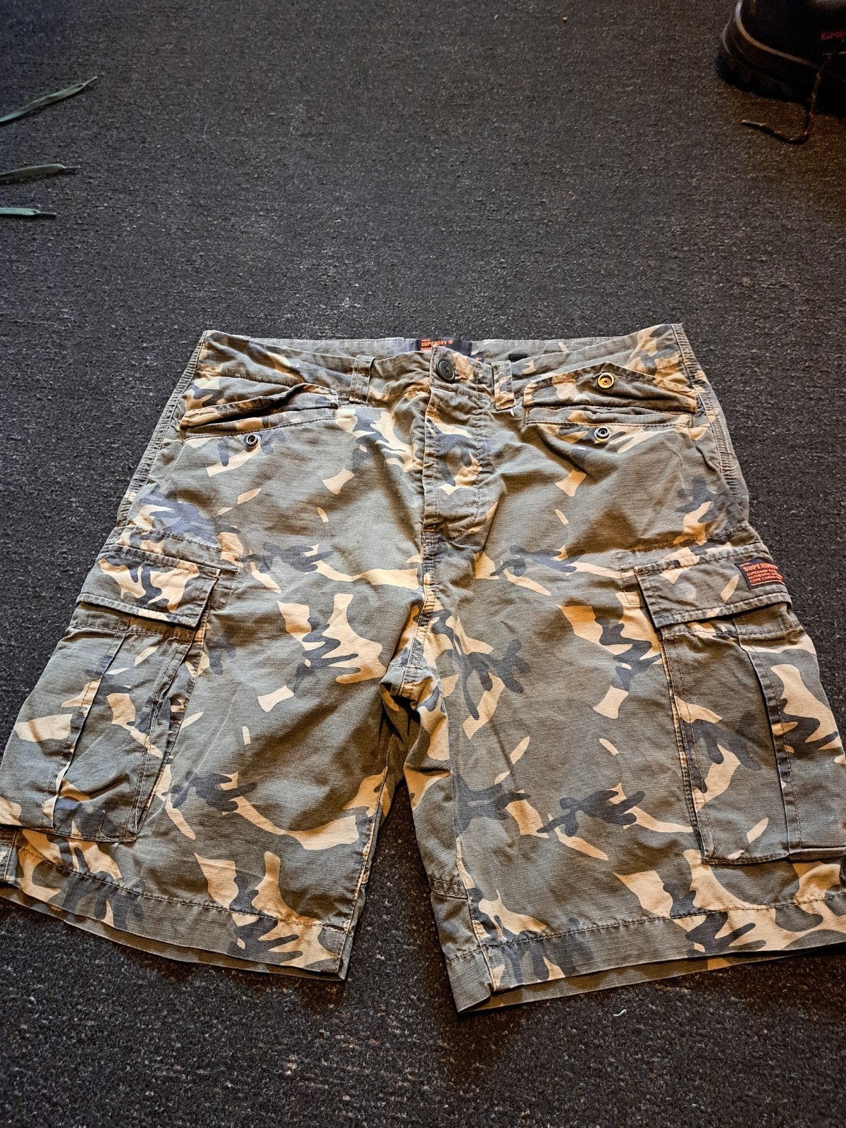 Super mooie superdry korte broek maat 33, Ophalen of Verzenden, Zo goed als nieuw, Maat 52/54 (L), Overige kleuren
