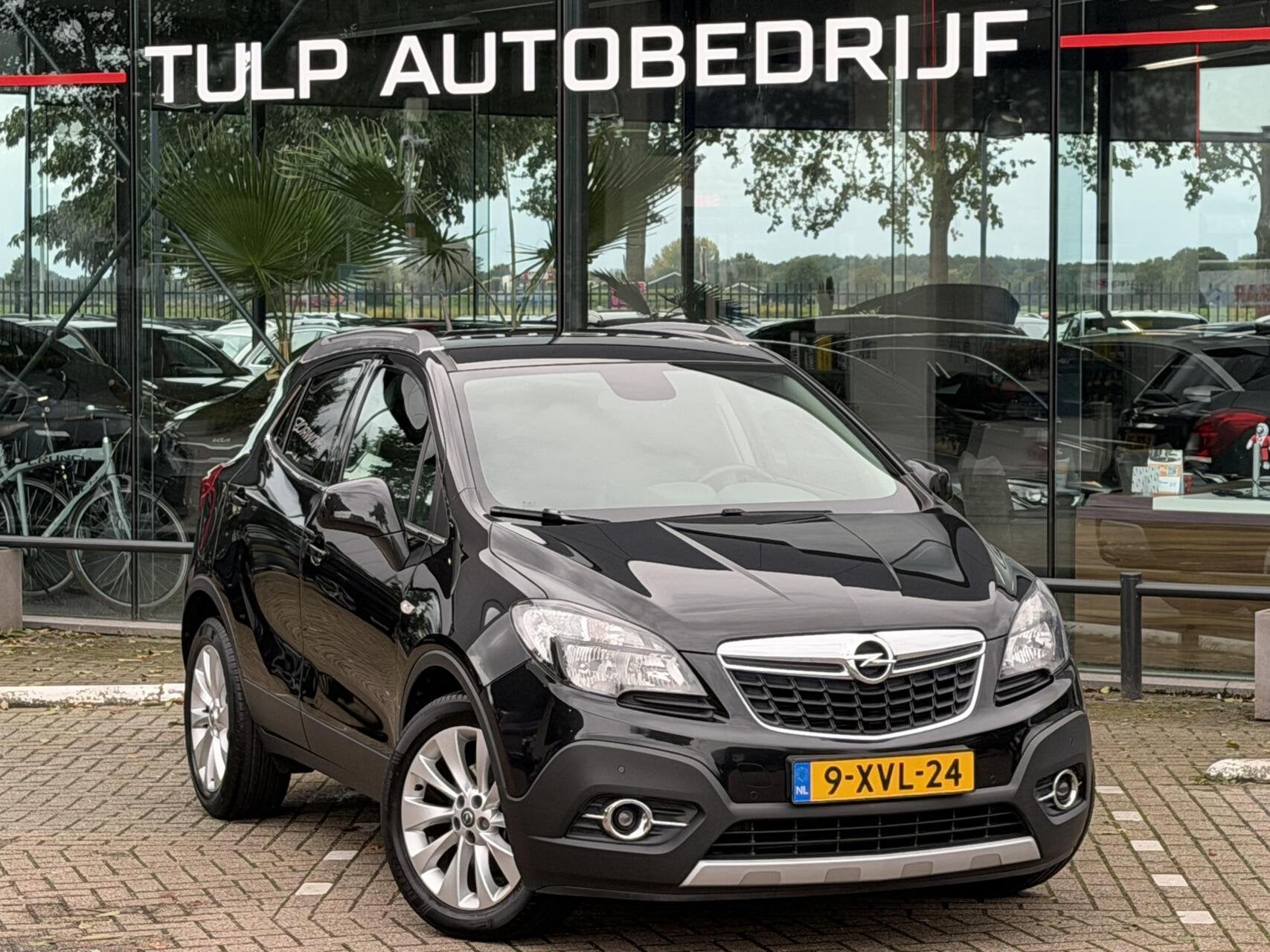 Opel Mokka 1.4 T Cosmo 2014 Leder Navi Nette Luxe auto, Auto's, Voorwielaandrijving, Euro 5, Gebruikt, 4 cilinders