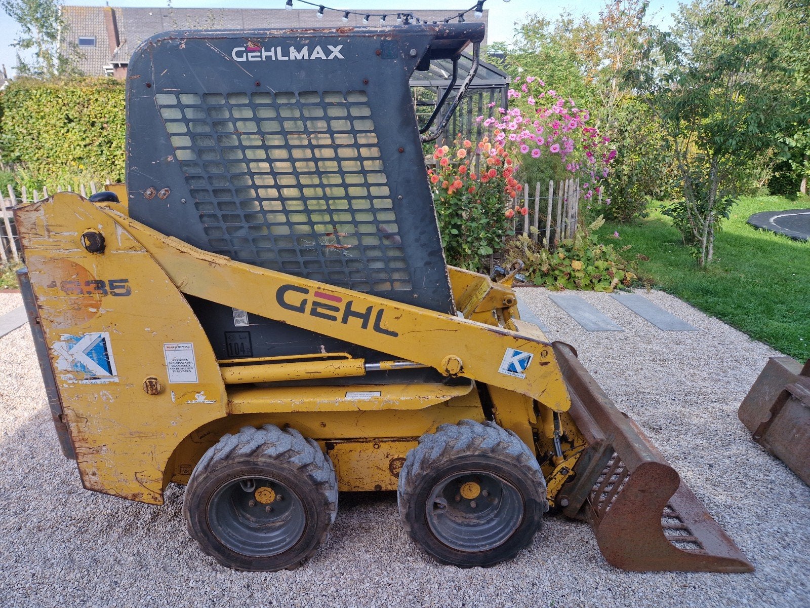 Schranklader Gehl SL1635 met puinriek en dichte bak, Zakelijke goederen, Ophalen of Verzenden, Wiellader of Shovel