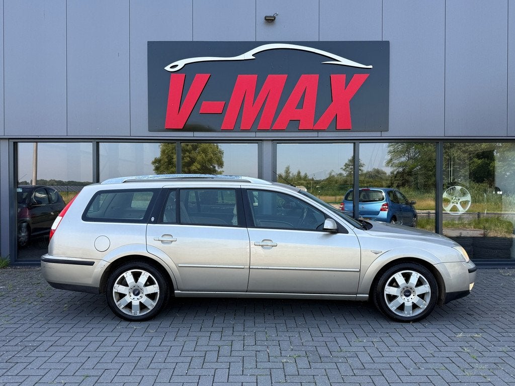 Ford Mondeo Wagon 2.0 16V AUT Ghia Executive Leder Navi Trek, Auto's, Ford, 730 kg, Mondeo, Beige, Onderhoudsboekje