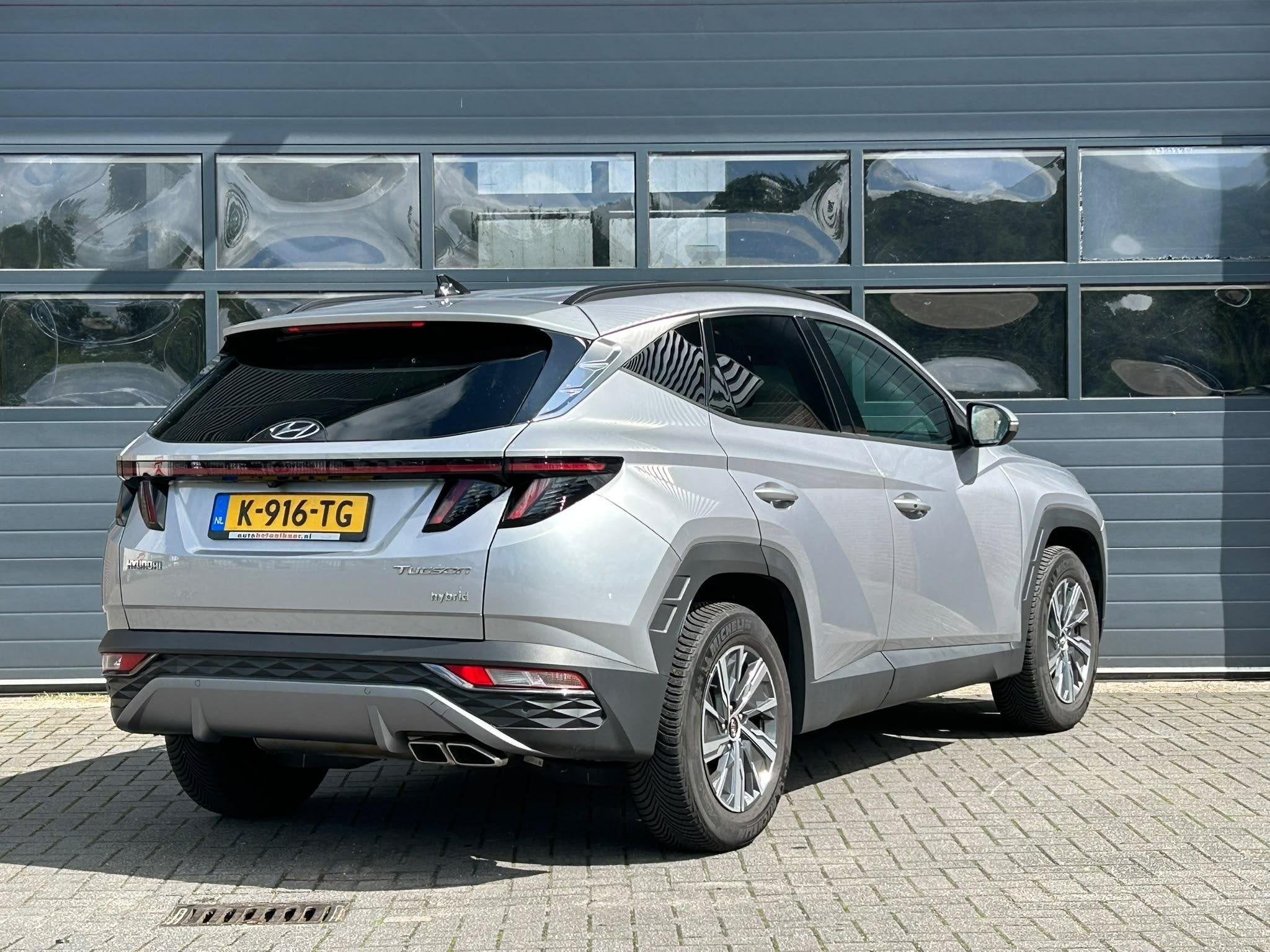 HYUNDAI TUCSON 1.6 T-GDI HEV COMFORT SMART I AUTOMAAT I CLIM, Auto's, Stof, Gebruikt, 4 cilinders, Met garantie (alle)