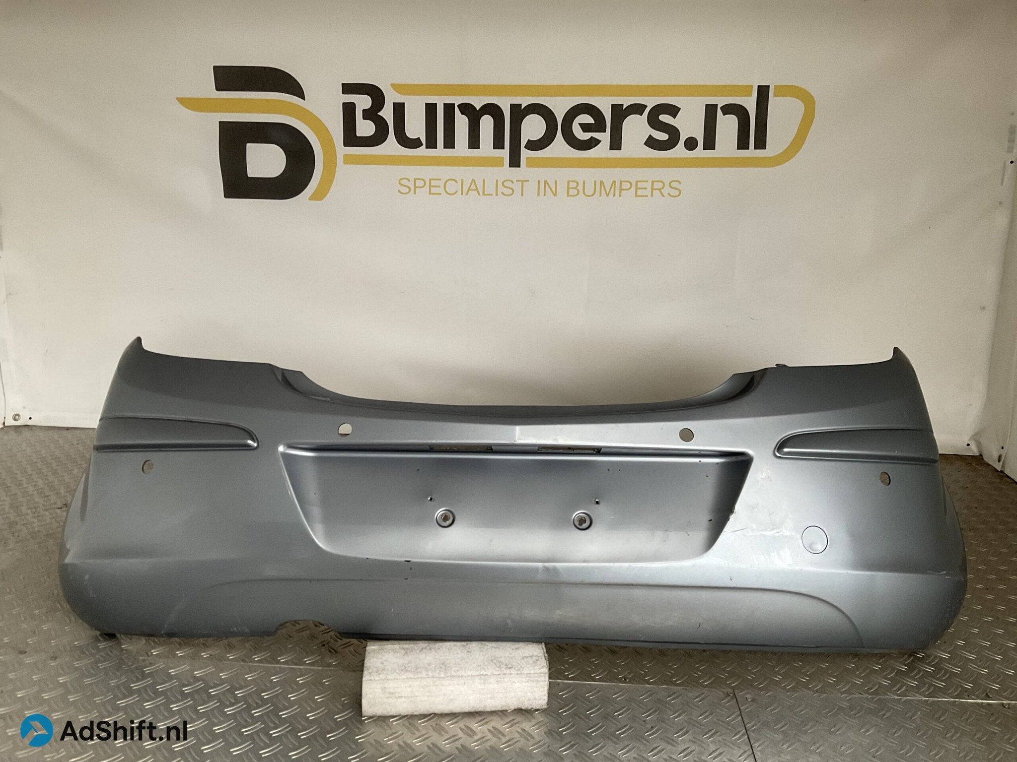 Bumper Opel Corsa D 332550271 Achterbumper F5-16307z, Auto-onderdelen, Carrosserie en Plaatwerk, Bumper