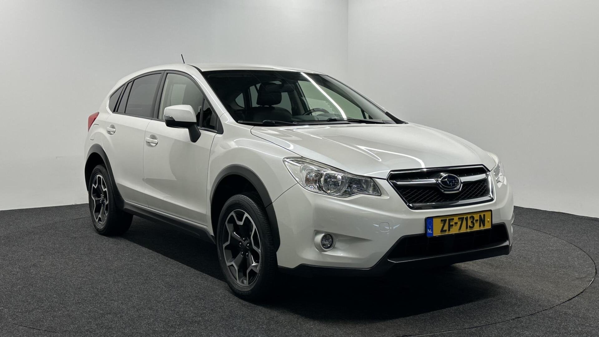 Subaru XV 1.6i Luxury AWD LEER CAMERA TREKHAAK NAVI CRUISE., Auto's, Euro 5, Zwart, 4 cilinders, Met garantie (alle)