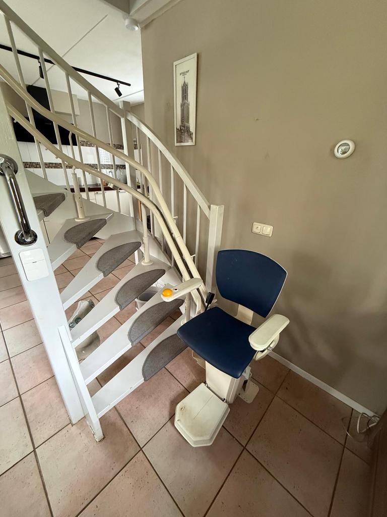 Traplift gebruikt met bocht, Ophalen