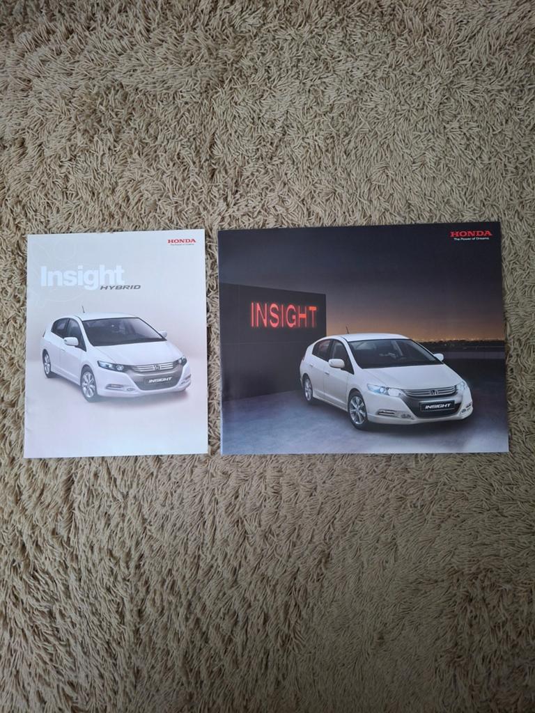 2x autofolder Honda Insight, Verzenden, Zo goed als nieuw, Honda