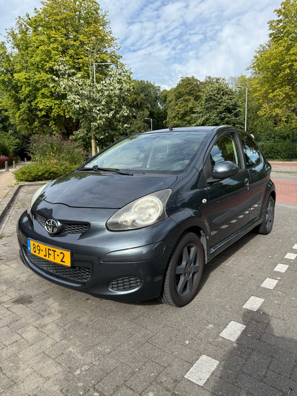 Toyota Aygo 1.0 12V Vvt-i 5DRS 2009 Grijs, Auto's, Voorwielaandrijving, Stof, 4 stoelen, 68 pk