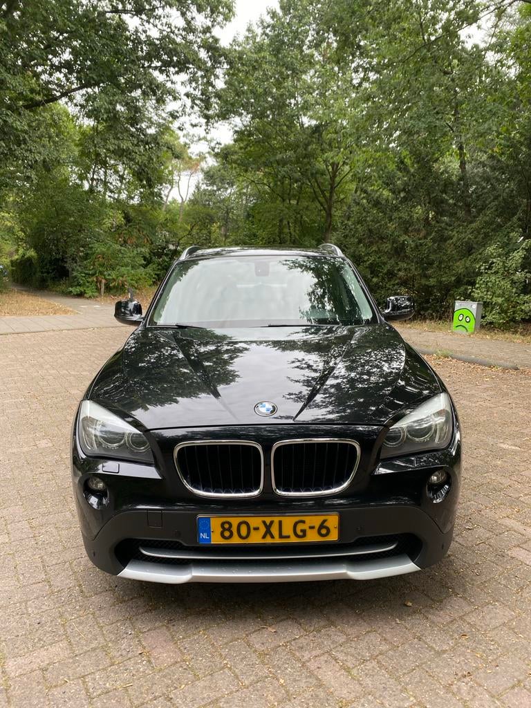 BMW X1 2.0 Sdrive 20I AUT 2012 Zwart, Auto's, Achterwielaandrijving, 1800 kg, 4 cilinders, Zwart