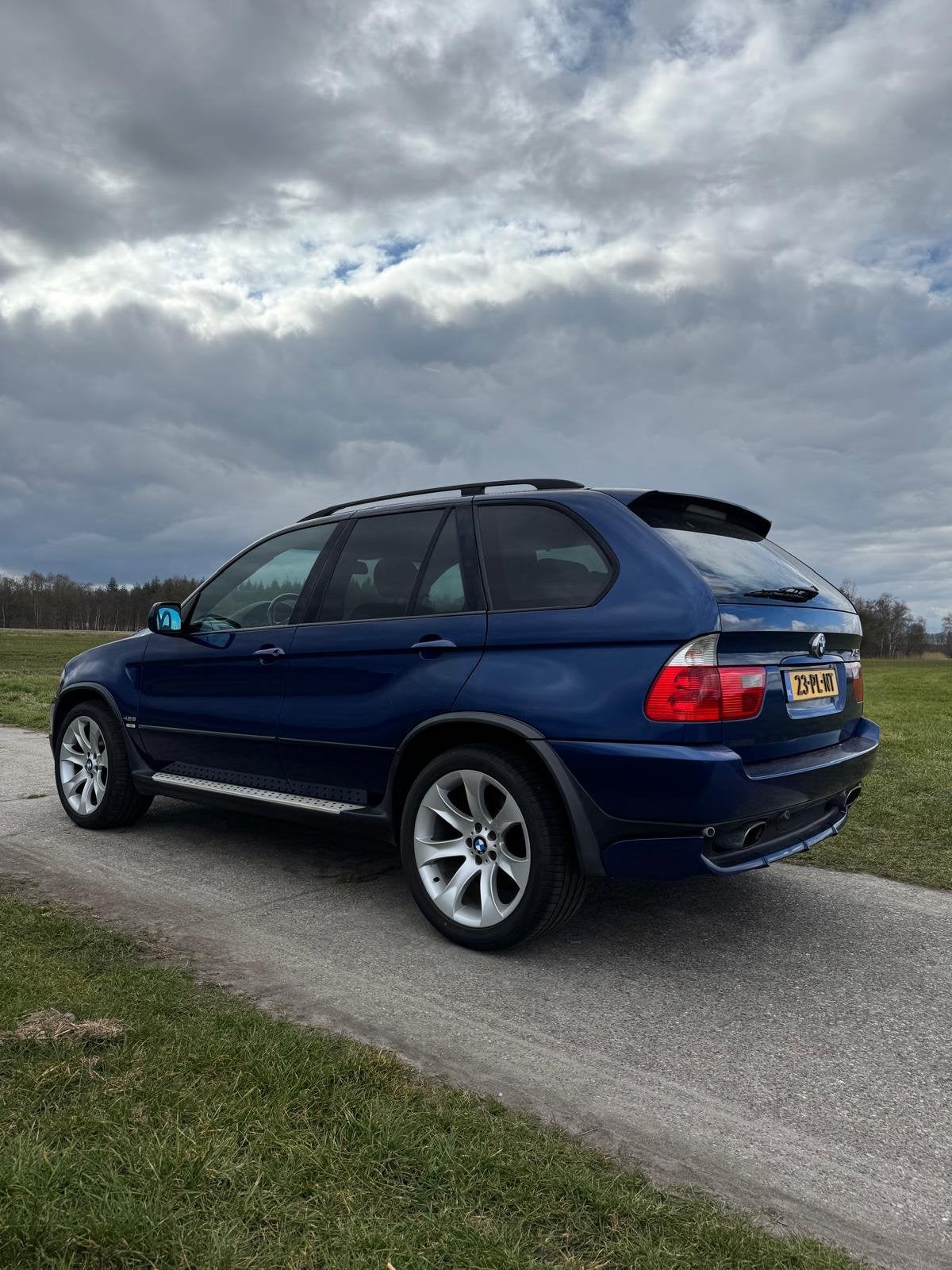 BMW X5 4.8 I AUT 2004 Blauw, Auto's, Automaat, 2175 kg, Blauw, Origineel Nederlands