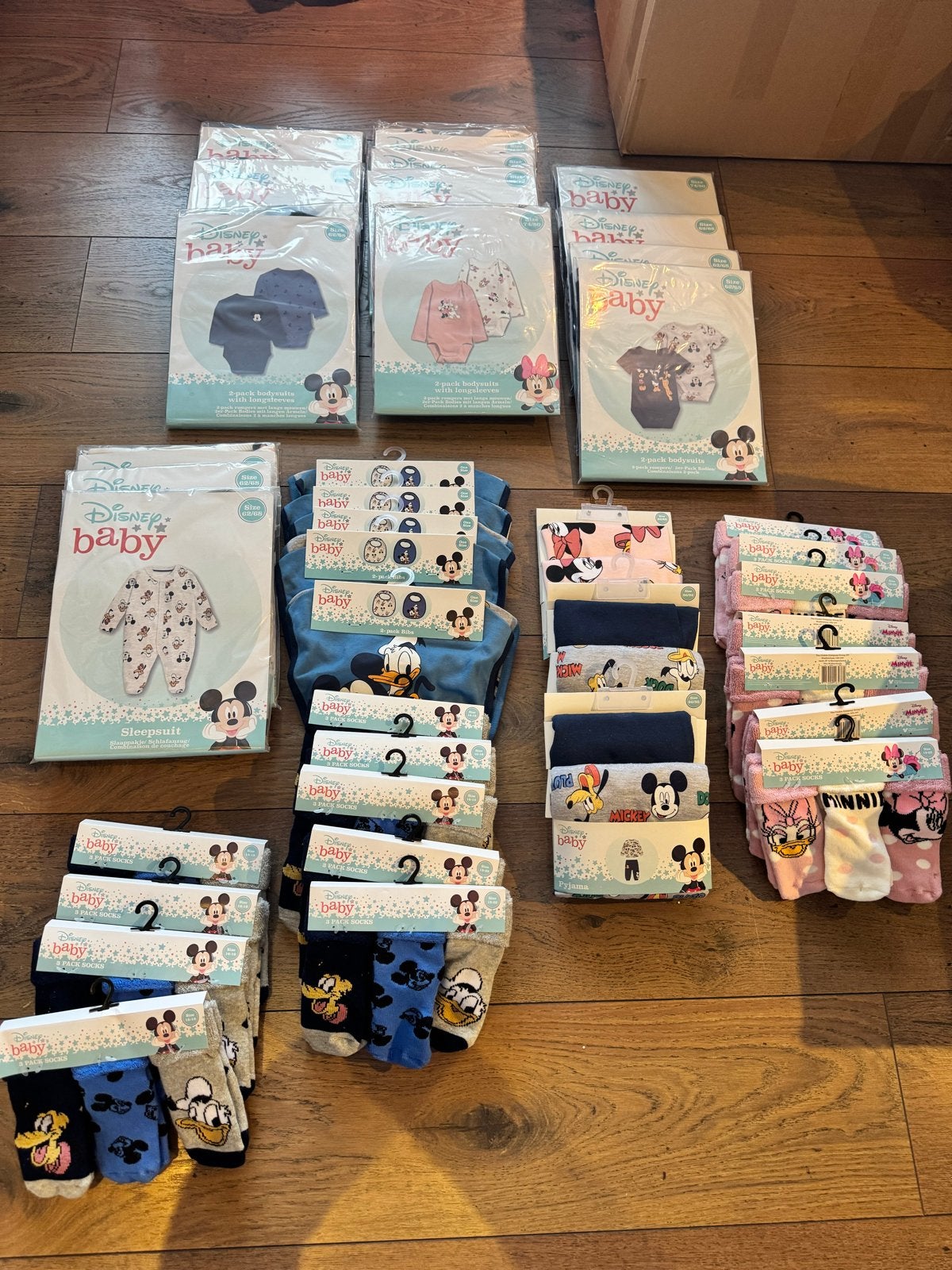 Grote partij Disney babykleding: rompers, pyjama's, sokken,, Ophalen of Verzenden, Nieuw, Jongetje of Meisje