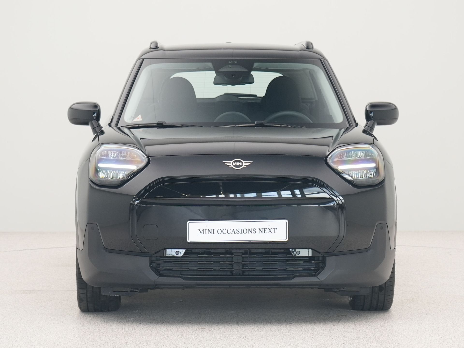 MINI Aceman E Essential (bj 2025, automaat), Auto's, Stof, Gebruikt, Met garantie (alle), Zwart