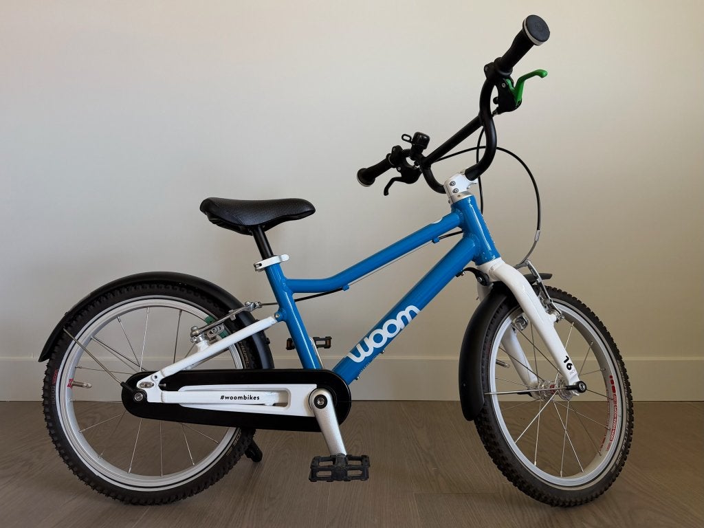 Woom Go 3 kinderfiets 16 inch - Blauw - bijna in nieuwstaat, Ophalen, 16 tot 20 inch, Velgrem, Zo goed als nieuw
