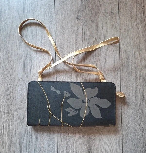 HEMA clutch schoudertas zwart goud bloemen nieuw, Ophalen of Verzenden, Nieuw, Zwart, Overige merken