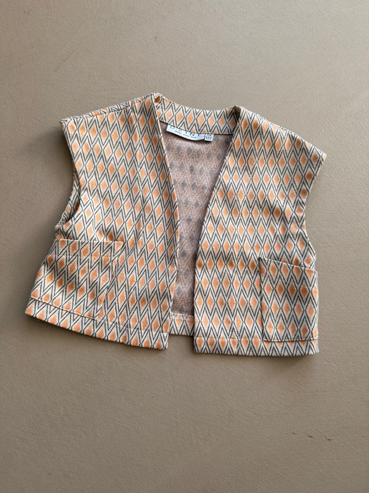 D-zine bolero vestje maat 116/122, Ophalen of Verzenden, Zo goed als nieuw, Meisje, Trui of Vest