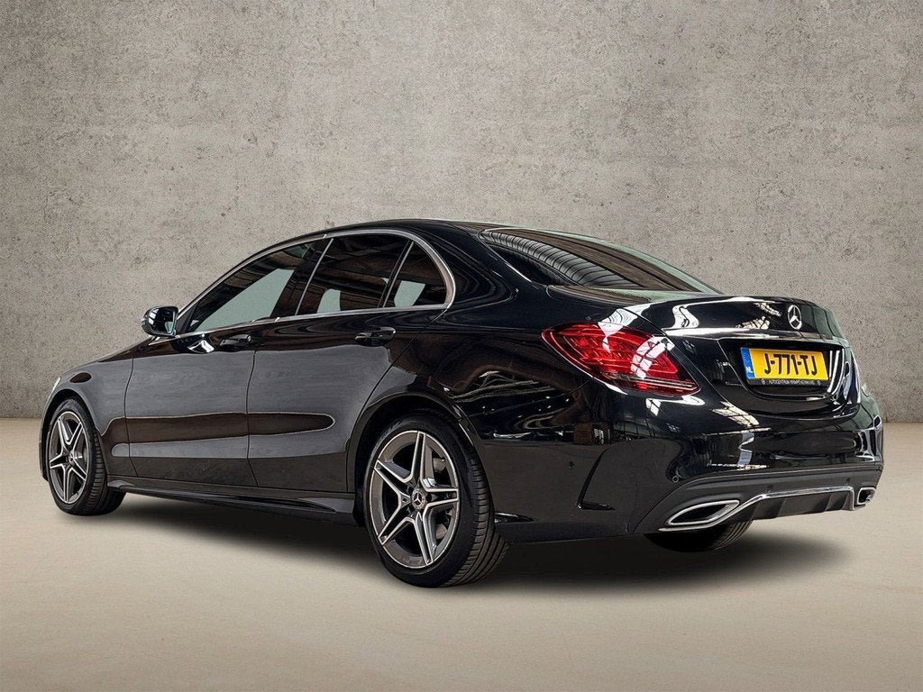 Mercedes-Benz C-Klasse 180 AMG Sport 156Pk Automaat (VIRTUAL, Auto's, Automaat, 12 maanden, Zwart, Sedan