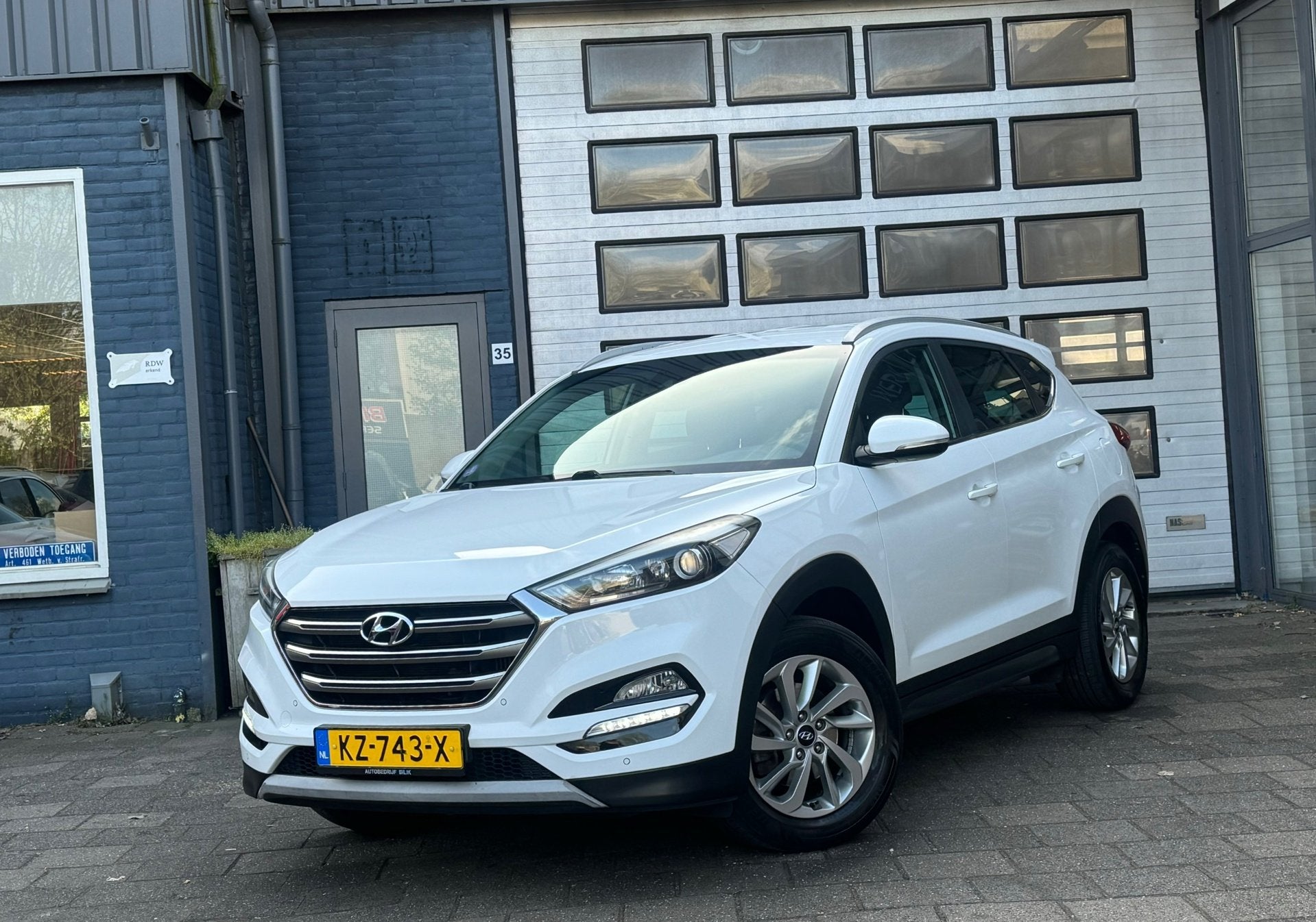Hyundai Tucson 1.6 T-GDi Comfort | Clima | Camera | Navi | N, Auto's, Voorwielaandrijving, Gebruikt, 4 cilinders, Wit