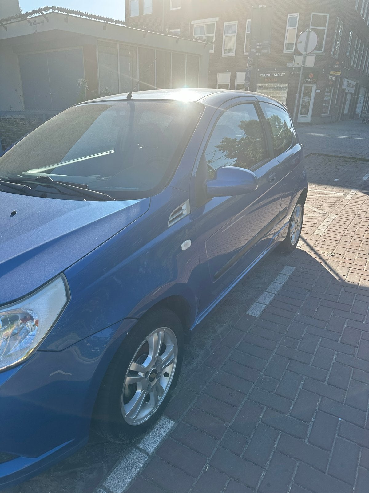 Chevrolet Aveo 1.4 16V 3D 2009 Blauw, Auto's, Voorwielaandrijving, 40 €/maand, Aveo, 100 pk