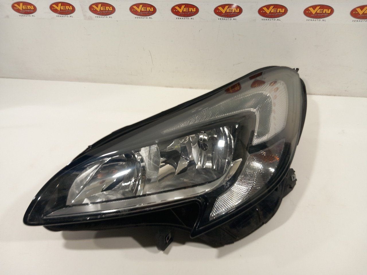 Koplamp links Opel Corsa, Auto-onderdelen, Verlichting, Gebruikt, Herkomst onderdeel bekend, 12 maanden garantie, Ophalen of Verzenden