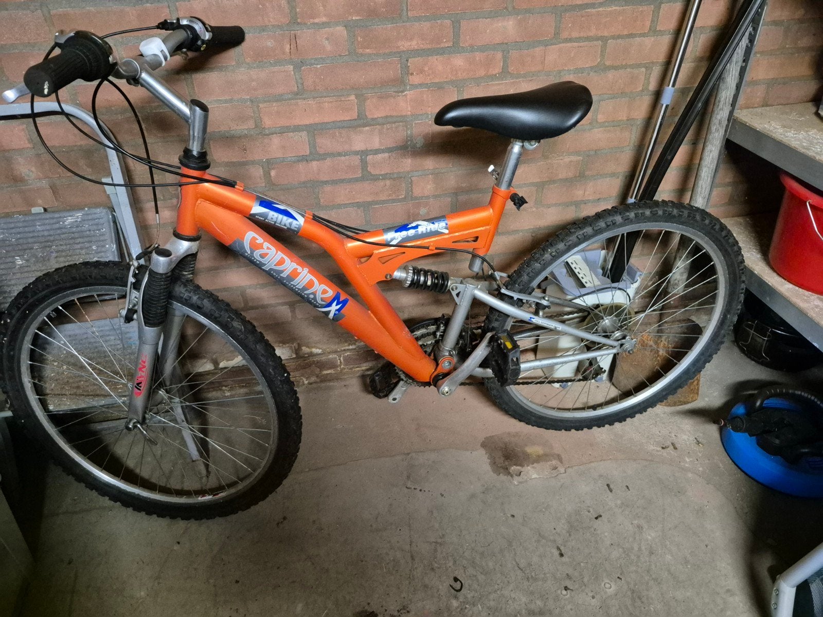 Oranje mountainbike met vering - Caprinex Z-Bike, Fully, Ophalen, Gebruikt, Overige merken