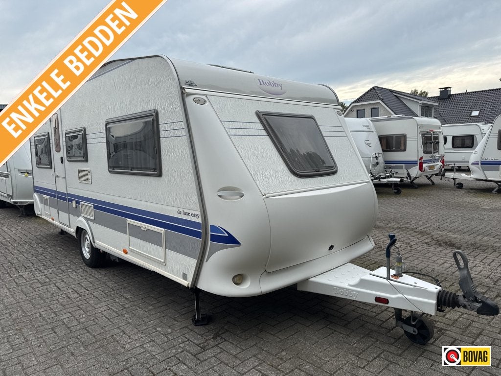 Hobby De luxe Easy 495 UL Mover/fietsdrager, Caravans en Kamperen, Caravans, Rondzit, Bedrijf, Overige typen, Tot en met 4