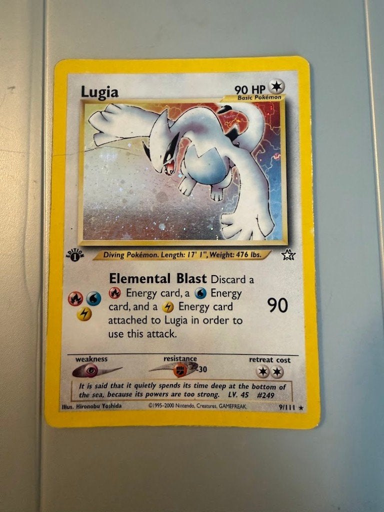 Lugia 9/111 First edition, Ophalen of Verzenden, Gebruikt, Losse kaart