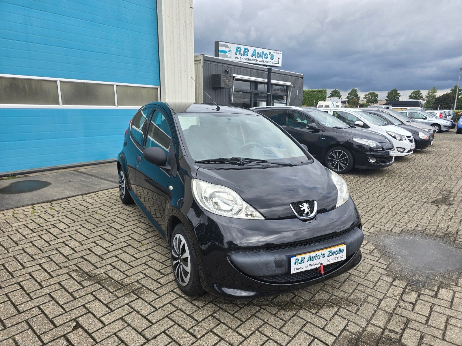 Peugeot 107 1.0 12V 5DR 2007 Zwart, Auto's, Peugeot, Voorwielaandrijving, Stof, Zwart, 4 stoelen