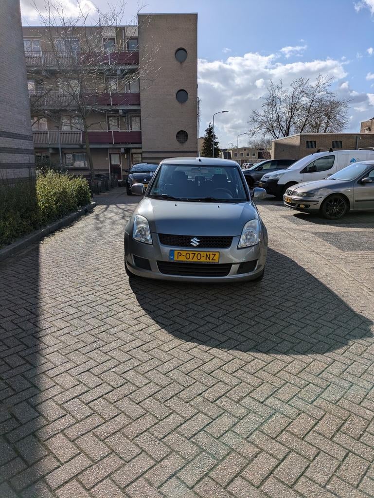Suzuki Swift 1.3 5D 2009 Grijs, Auto's, Suzuki, Voorwielaandrijving, Stof, 40 €/maand, 400 kg