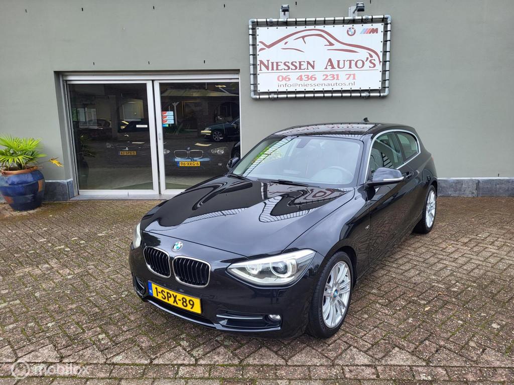 BMW 1-serie 116i EDE Sport Navi/Xenon/Trekhaak Ketting V.V, 1-Serie, 4 cilinders, Zwart, Origineel Nederlands