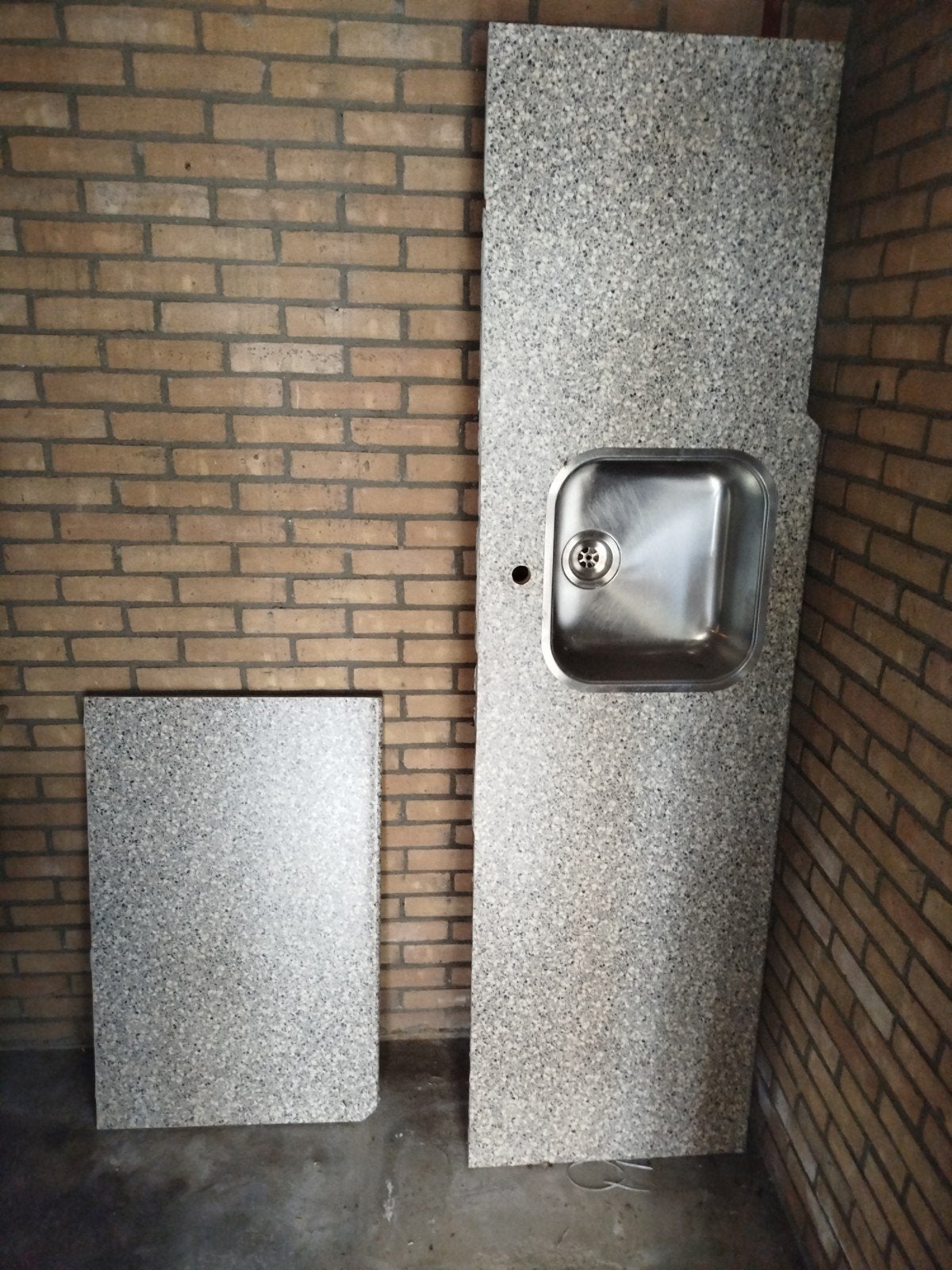 L-vormig keukenblad met spoelbak en boiler, Ophalen