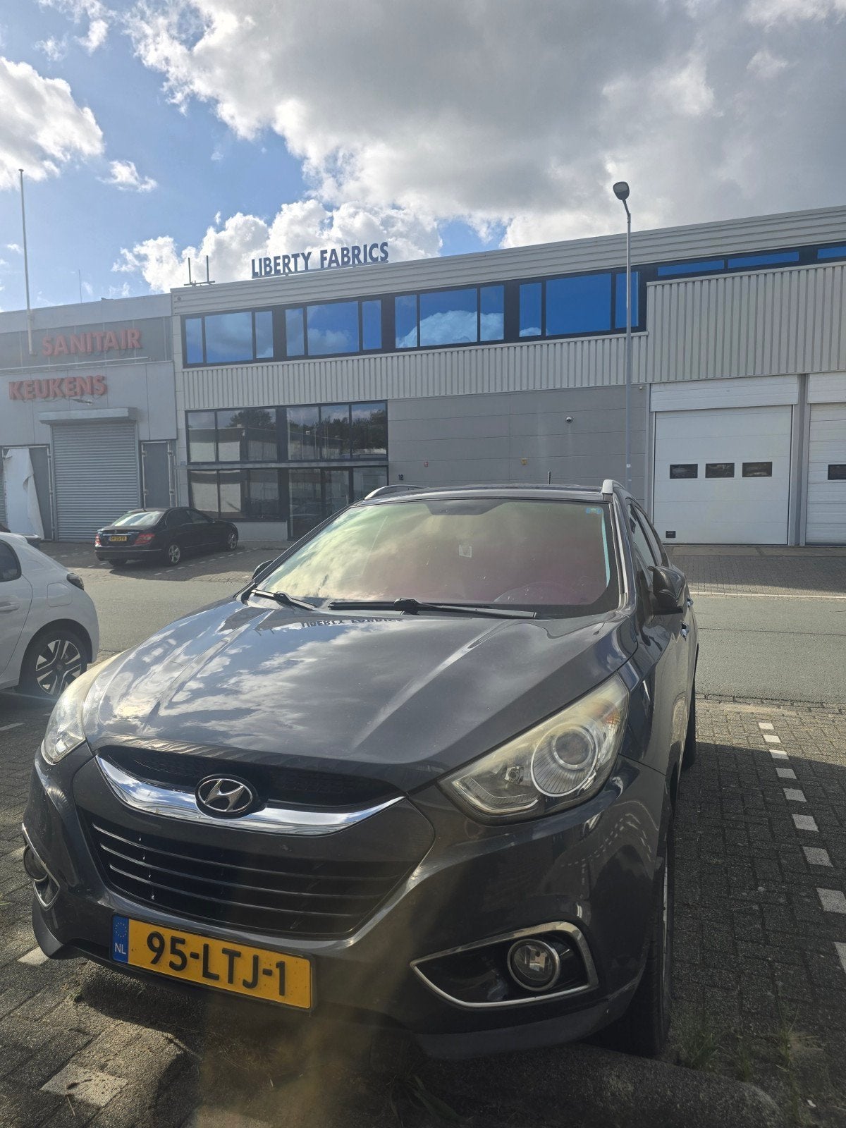 Hyundai iX35 2.0 I Cvvt 2WD AUT 2010 Grijs, Zwart, 4 cilinders, Leder en Stof, 163 pk