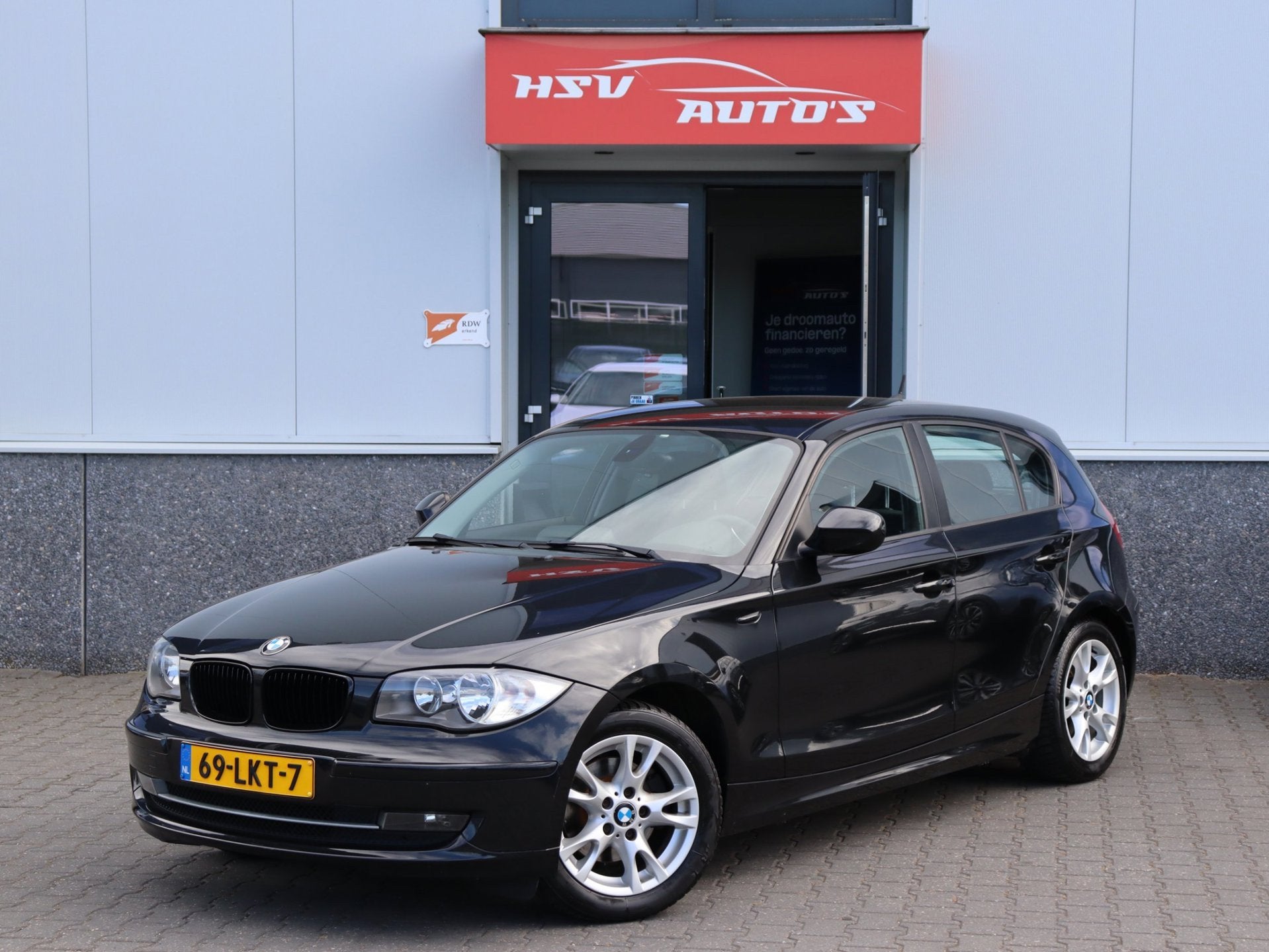 BMW 1-serie 118i Business Line navi LM cruise org NL, Auto's, 1-Serie, Euro 5, Achterwielaandrijving, Zwart