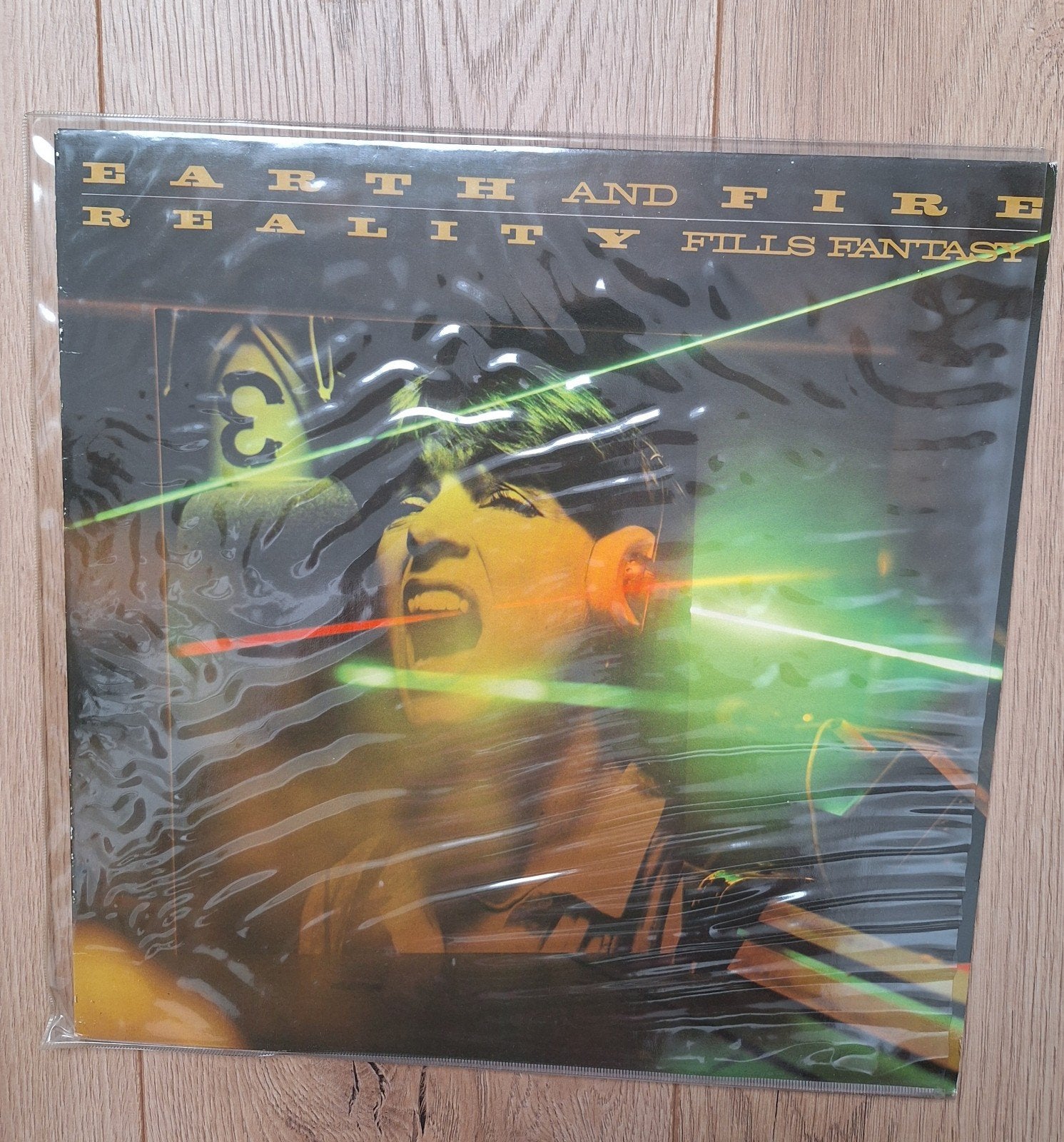 Lp Earth and Fire, Reality Fills Fantasy, Ophalen of Verzenden, Gebruikt, 12 inch