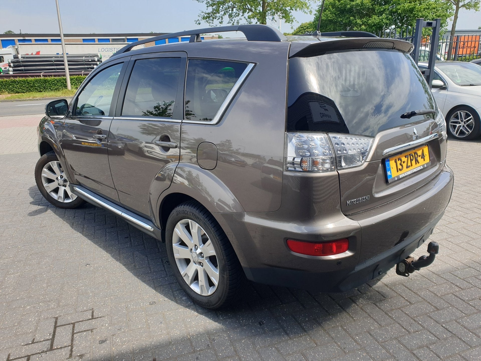 Mitsubishi Outlander 2.0 Edition Two Automaat, Auto's, Beige, 4 cilinders, Bruin, Xenon verlichting